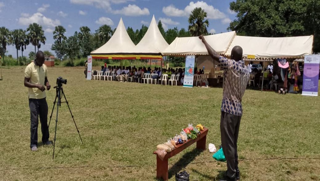 Health assistant conducting food demonstration for malnutrition management